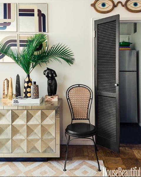 photo of a vignette in the home of New York City interior designer Nicholas Obeid's apartment featuring one of a air of chairs sourced by Heather Karlie Vieira of HKFA